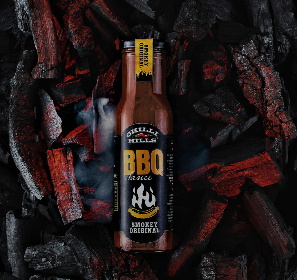 Бутилка барбекю сос Chilli Hills върху въглени